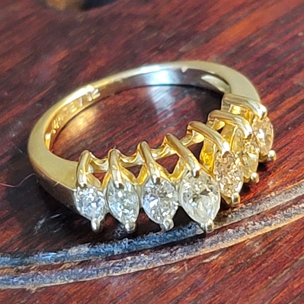 14k yellow gold band with 1 CT SI1 and SI2 white diamonds size 6